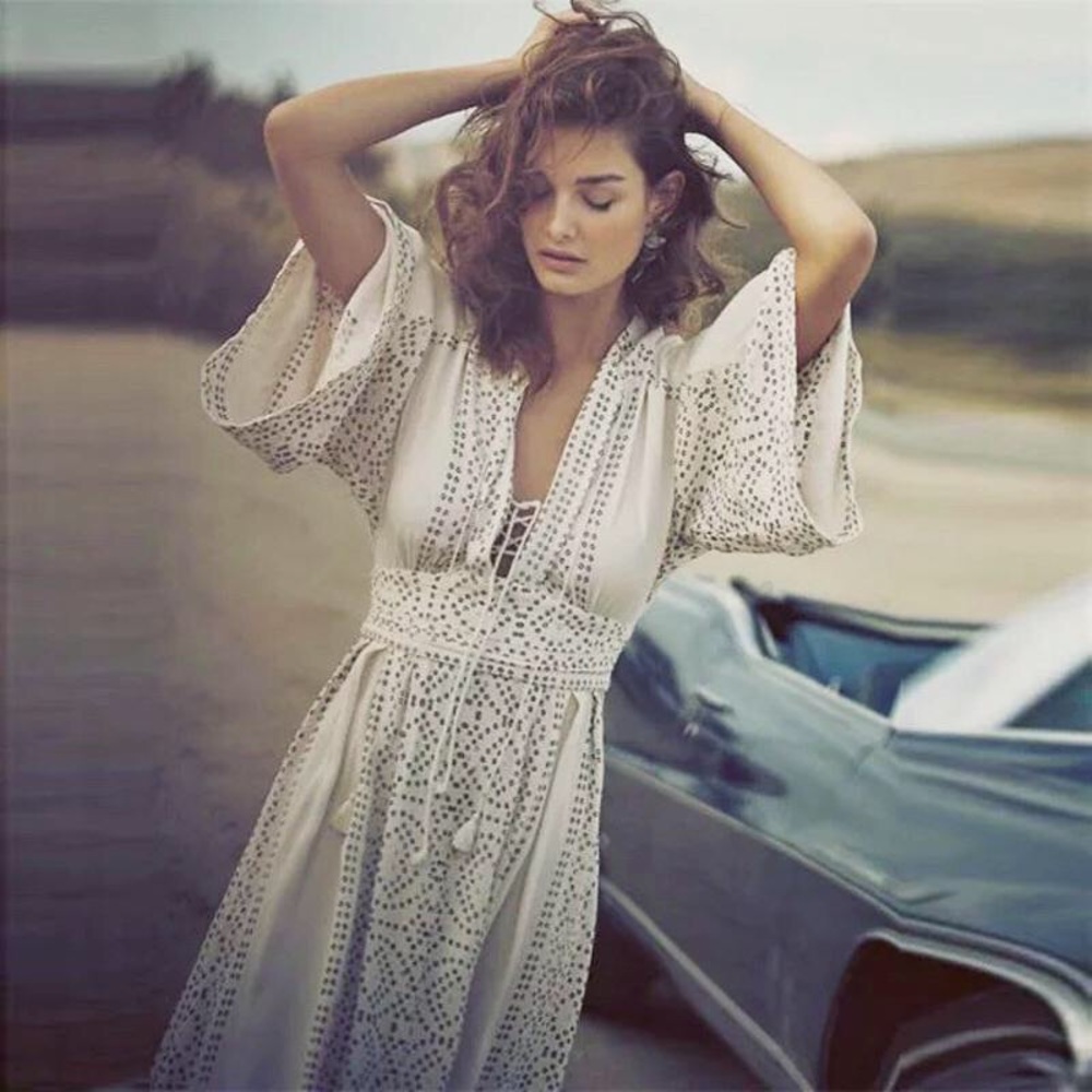 White and gold flowy boho dress.